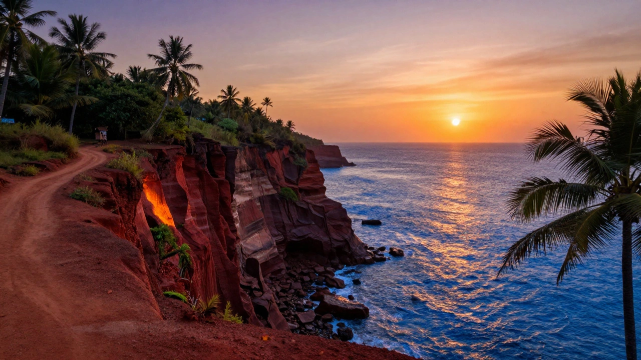 Red cliffs of Varkala in Kerala overlooking the ocean during a golden sunset.