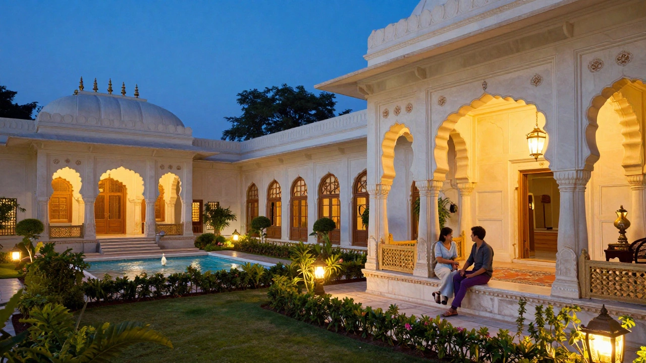 Luxurious heritage hotel courtyard in Rajasthan with marble arches and warm evening lights.
